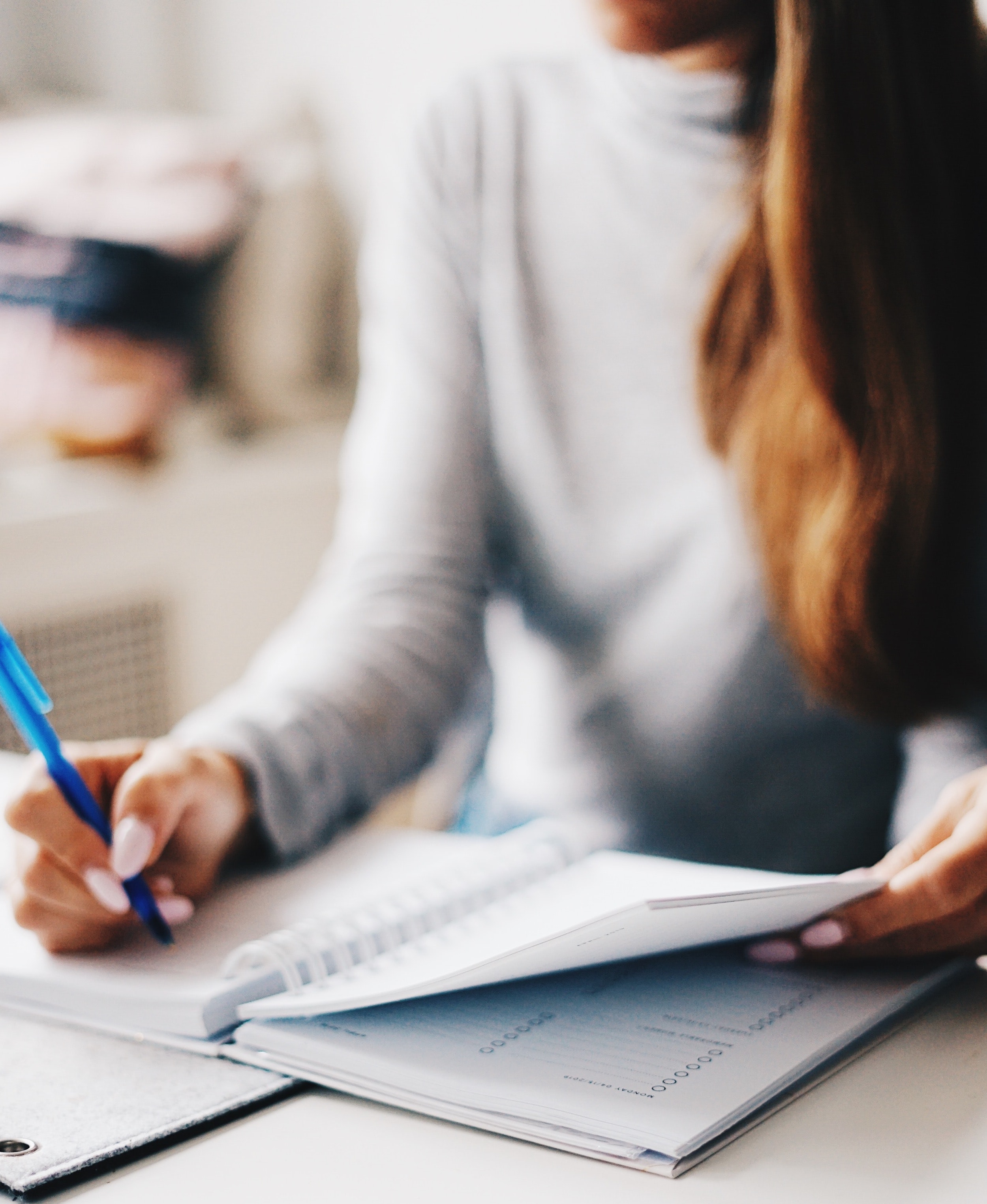 a photo of person with a planner